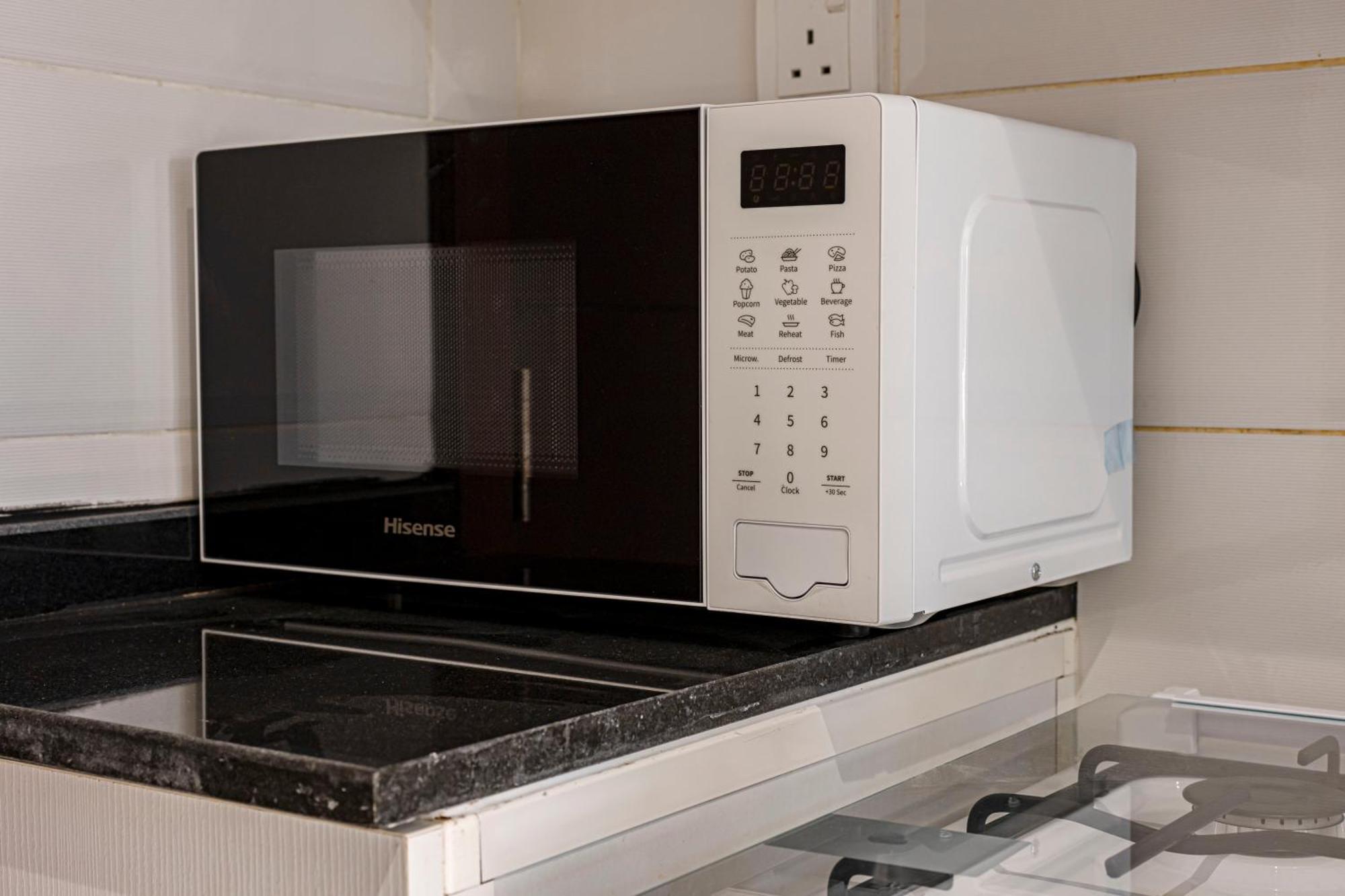Cozy And Contemporary In Dubailand Apartment